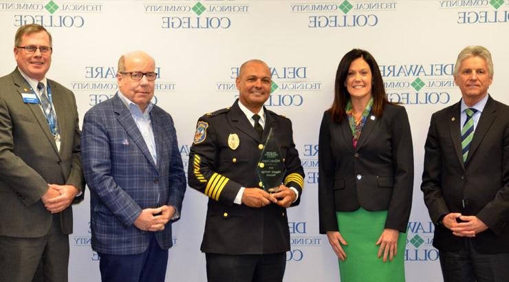 Delaware Tech President Dr. Mark Brainard; Dr. Lora Johnson, Vice President and Wilmington Campus Director; Wilmington Police Chief Wilfredo Campos; Michael Hare, Delaware Tech Board of Trustees member; and Daniel Ehmann, Vice President and Stanton Campus Director.